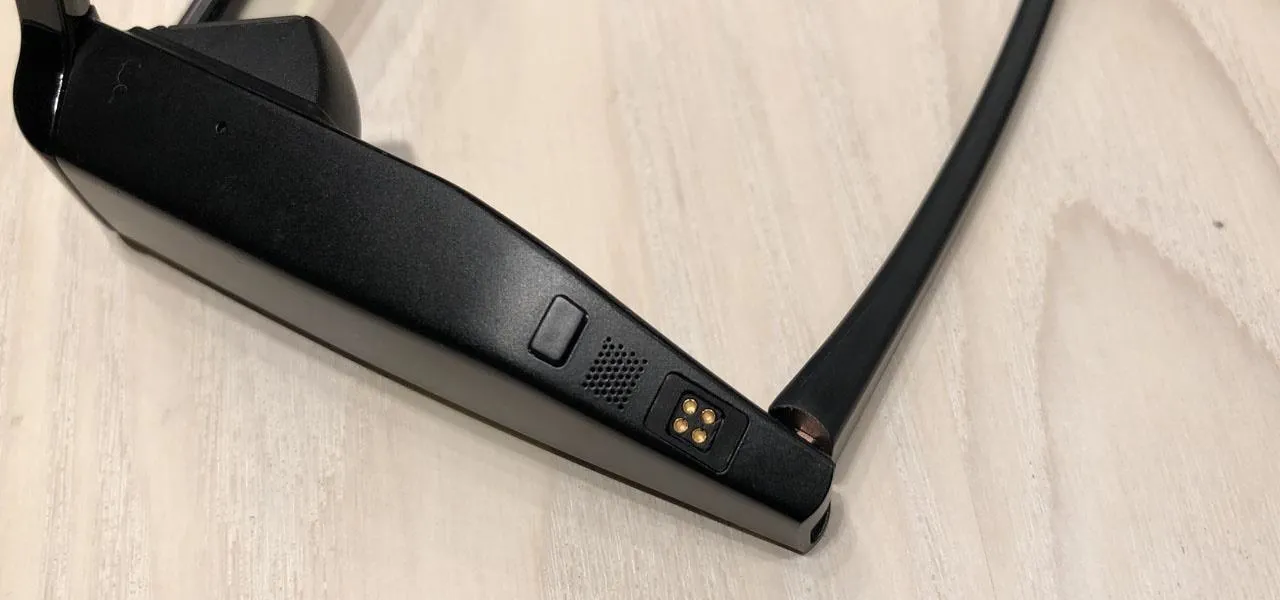 Smart glasses with a sleek design and buttons on the side.